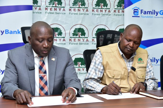 1. Family Group Foundation Chair Dr. Francis Muraya and Kenya Forest Service Chief Conservator of Forests Alex Lemarkoko sign a partnership aimed at advancing Ngong Hills restoration through a one-million tree seedlings nursery project.