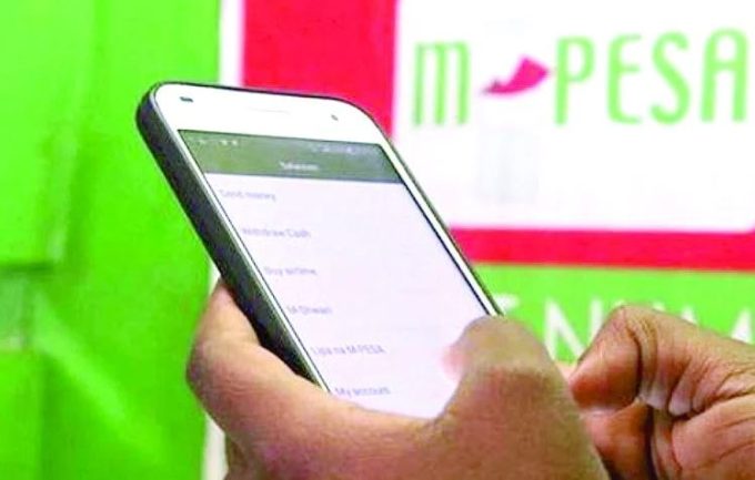 A person transacting on M-pesa
